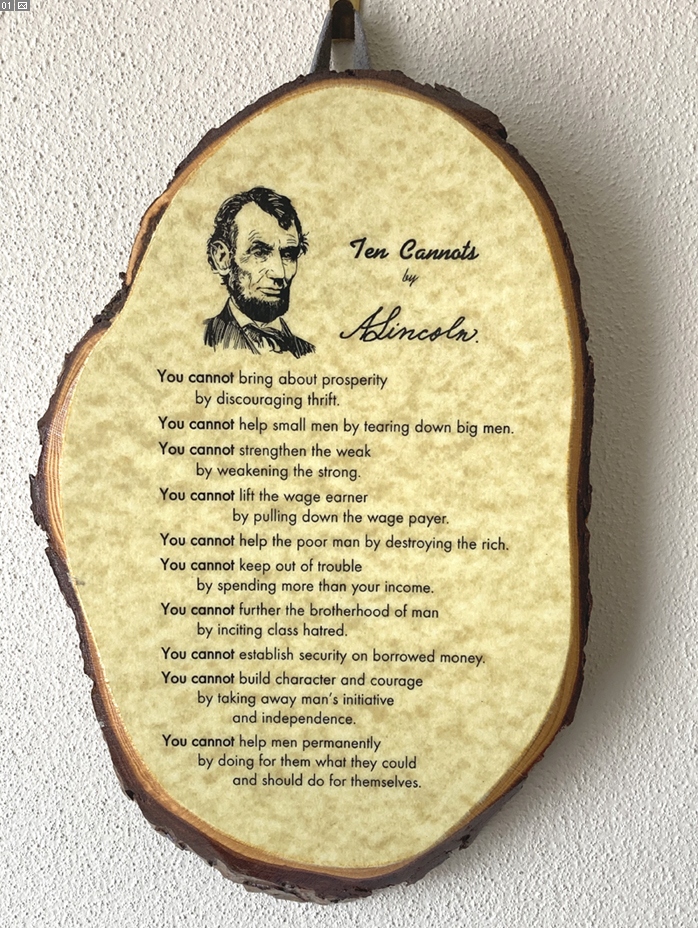 Original wooden Ten Cannots plaque bearing a portrait and attribution to Abraham Lincoln